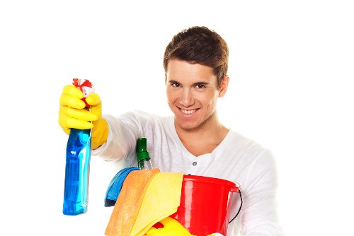 Cleaner treating fabric chairs in a Westminster property